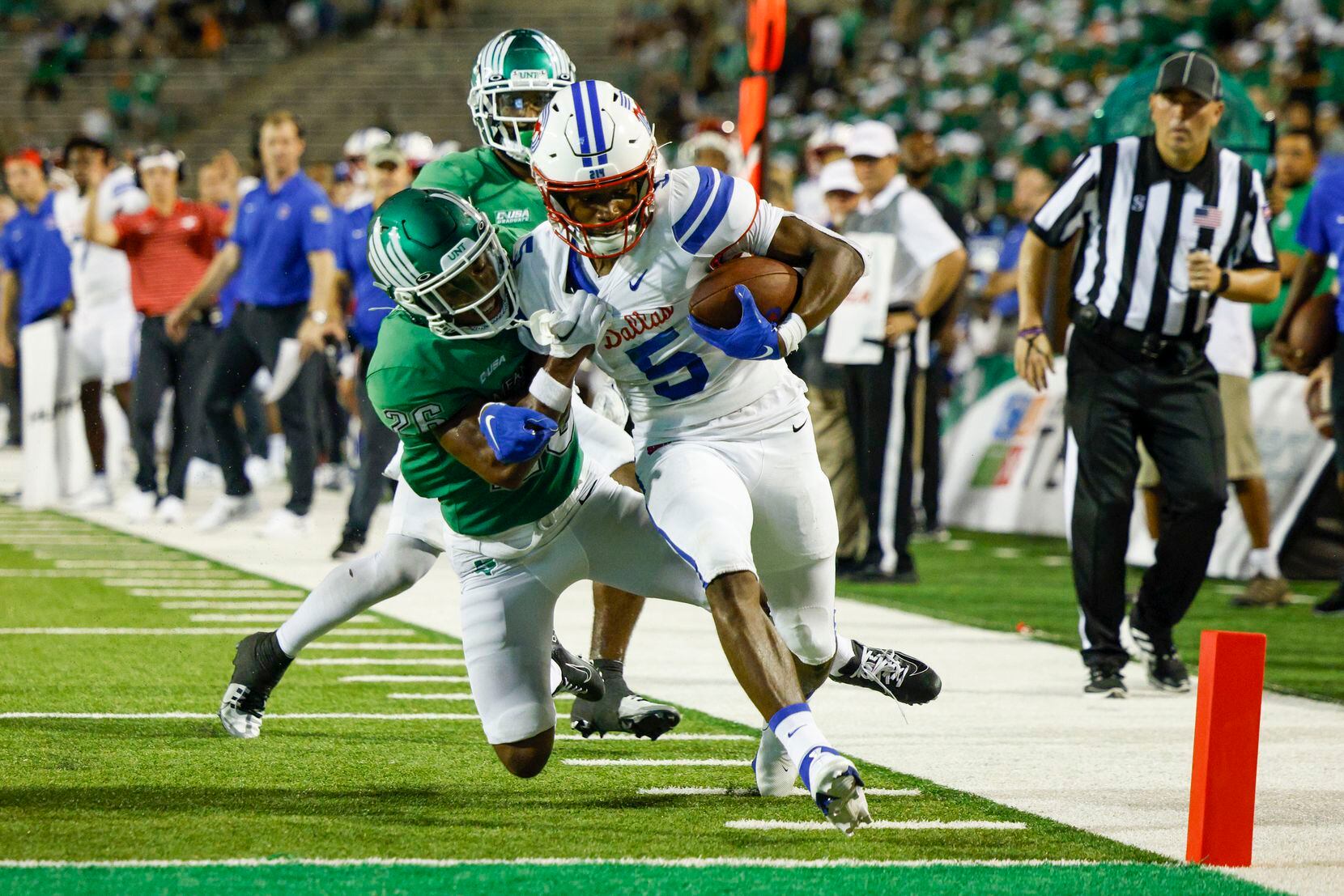 SMU wide receiver Moochie Dixon (5) runs into the end zone for a touchdown while UNT...
