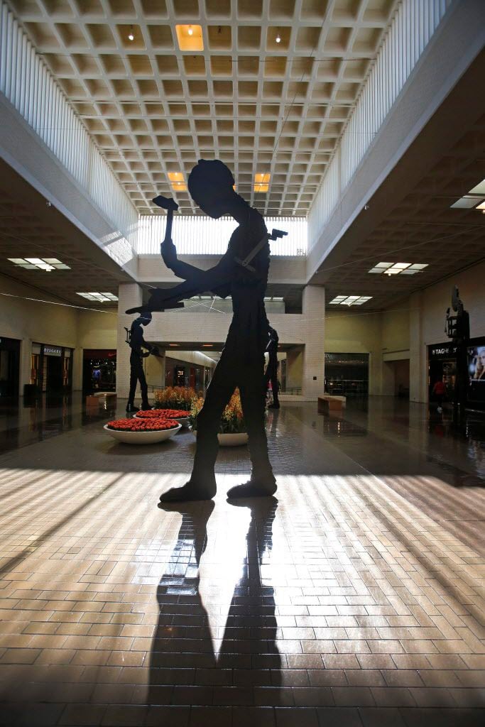 The sculpture "Five Hammering Men" (1982) by Jonathan Borofsky is pictured at NorthPark...