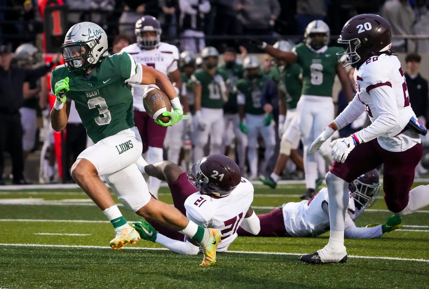 Frisco Reedy running back Dennis Moody (3) gets past Mansfield Timberview defensive back...