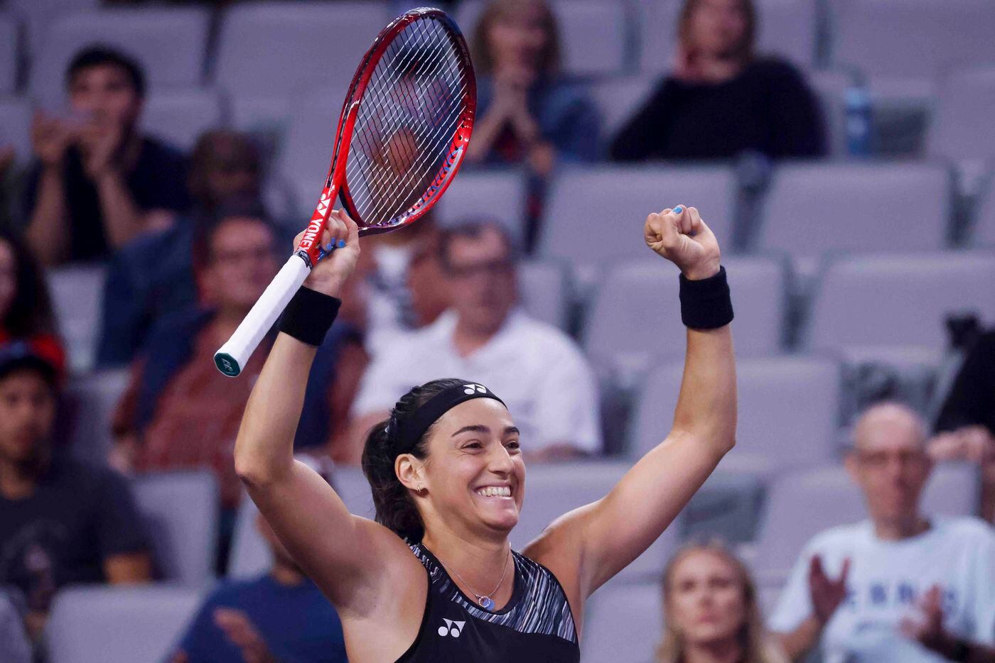 Caroline Garcia of France celebrates after winning her match against Coco Gauff of the USA...