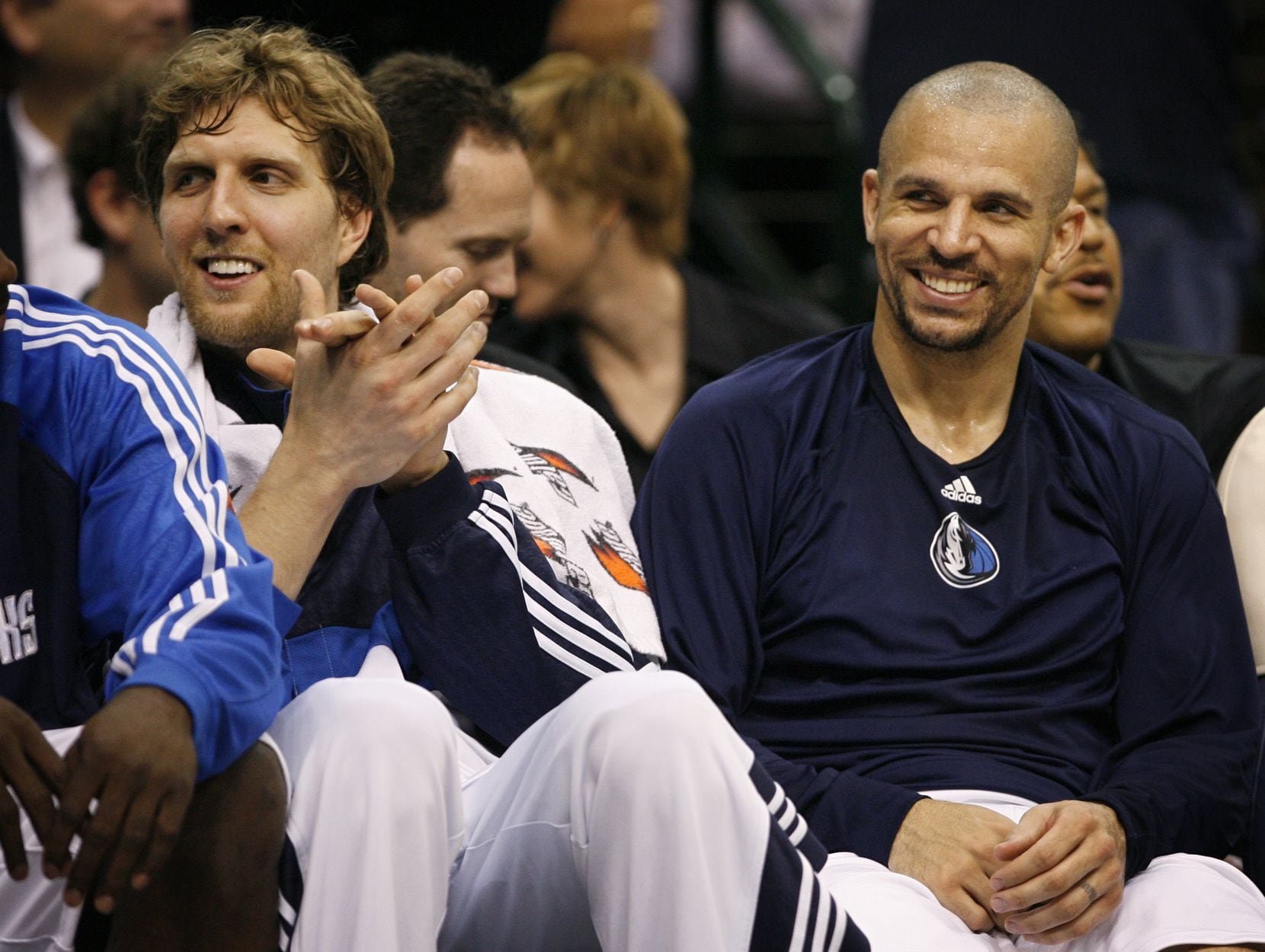 Dallas Mavericks Dirk Nowitzki (left) and Jason Kidd cheer and laugh as they sit on the bench late in the second half of the Mavericks 99-83 win over the SuperSonics on April 8, 2008 at the American Airlines Center in Dallas.