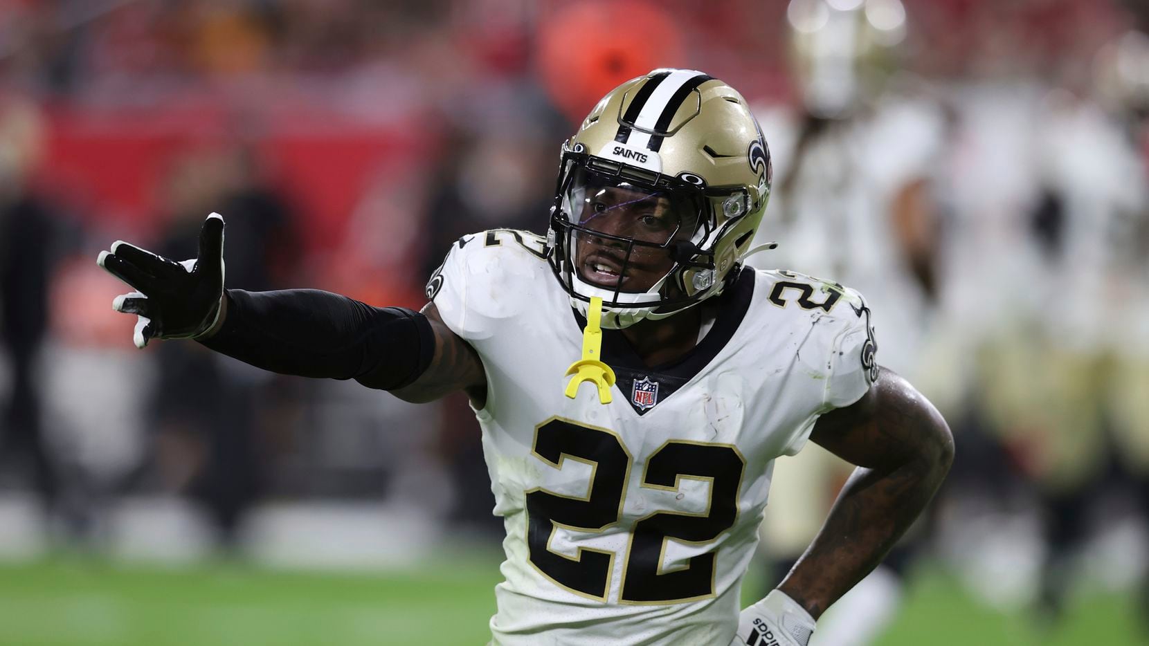FILE - New Orleans Saints defensive back C.J. Gardner-Johnson (22) reacts to a stop against...