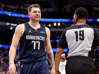 Dallas Mavericks guard Luka Doncic (77) reacts toward the Utah bench after being fouled by...