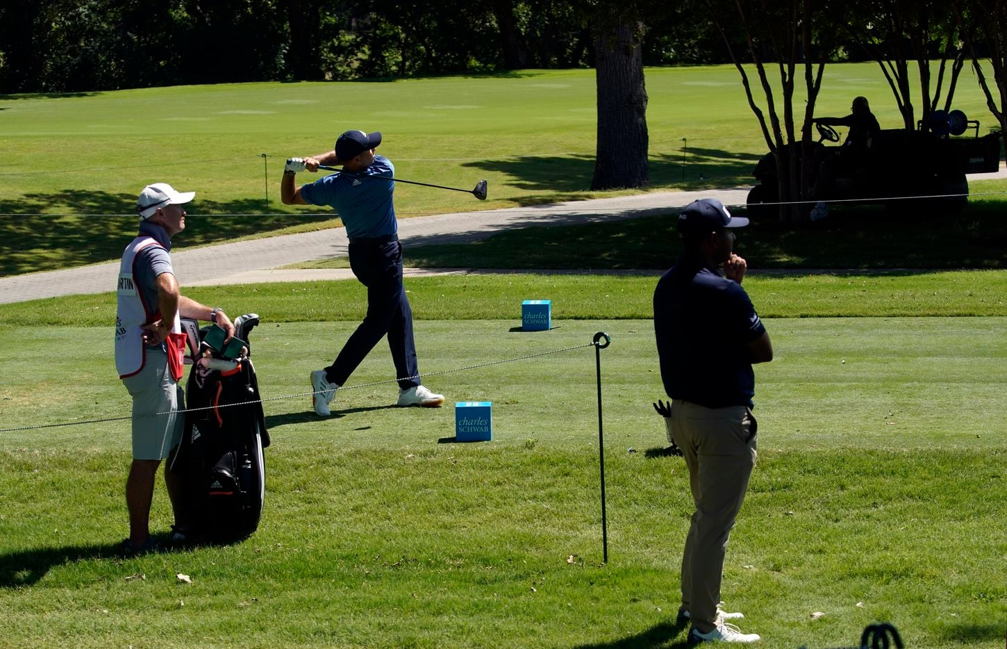 Before no fans around the 3rd tee box, PGA Tour golfer Sergio Garcia watches his drive...