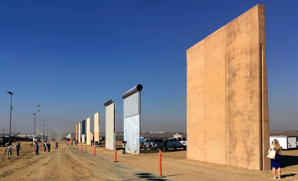 In October, visitors checked out prototypes of border walls in San Diego, Calif. The Trump administration has proposed spending $18 billion over 10 years to significantly extend the border wall with Mexico. The plan provides one of the most detailed blueprints of how the president hopes to carry out a signature campaign pledge.