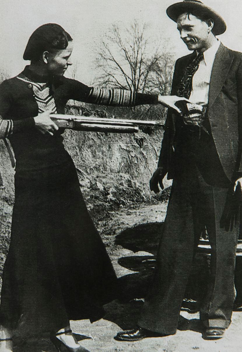 Clyde Barrow and Bonnie Parker posed for a photo in 1932 in the Ozarks.
(Photo courtesy of...