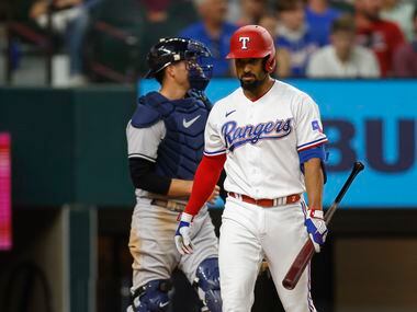 Texas Rangers second baseman Marcus Semien (2) reacts after striking out during the sixth...