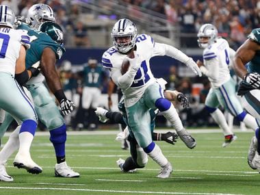 Dallas Cowboys running back Ezekiel Elliott (21) rushes up the field in a game against the Philadelphia Eagles during the first half of play at AT&T Stadium in Arlington, Texas on Sunday, October 20, 2019.