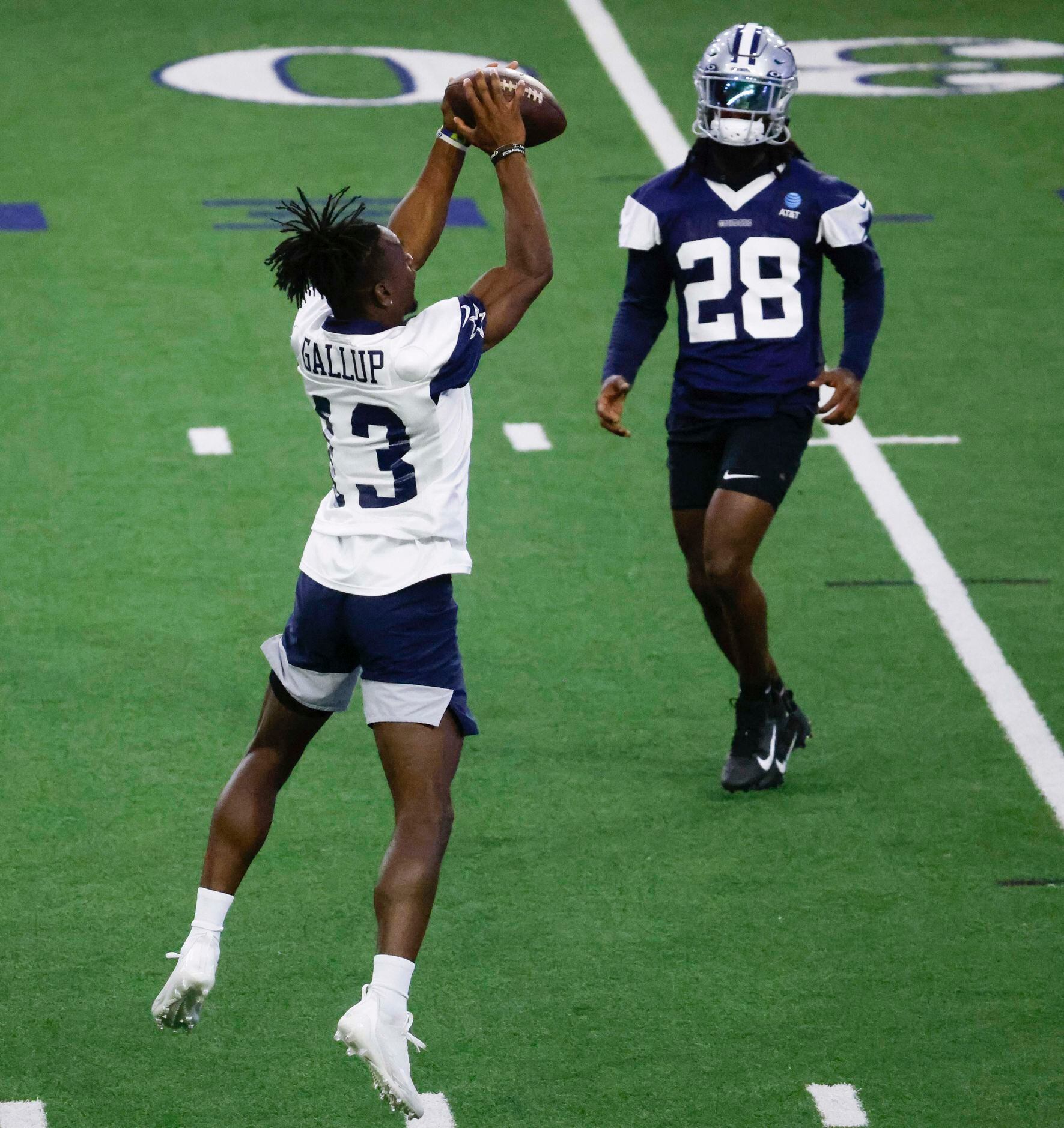 Dallas Cowboys wide receiver Michael Gallup (13) catches a pass past Dallas Cowboys safety...