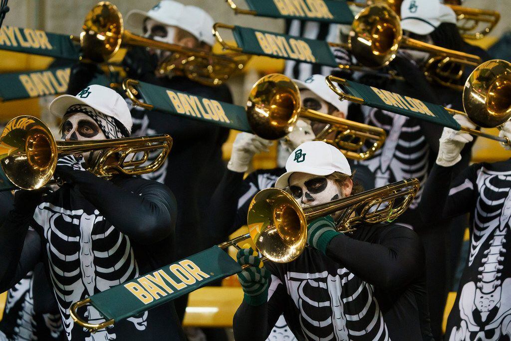 Members of the Baylor band wear Halloween costumes during the second half of an NCAA...