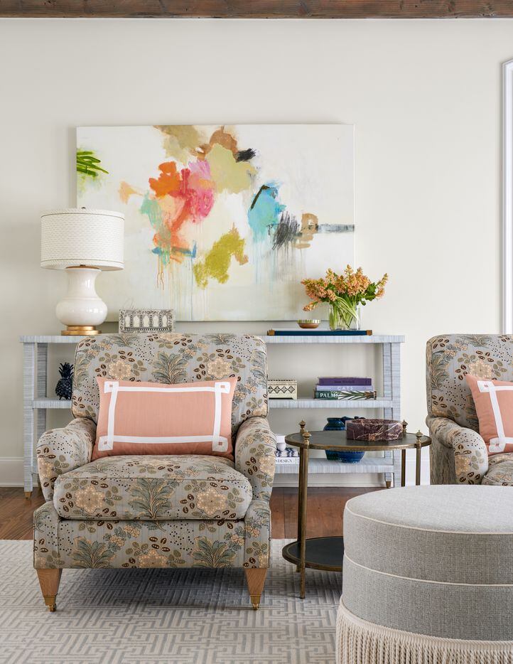 Traditional floral patterns, fringe trim, and a pop of contemporary art all come together in...
