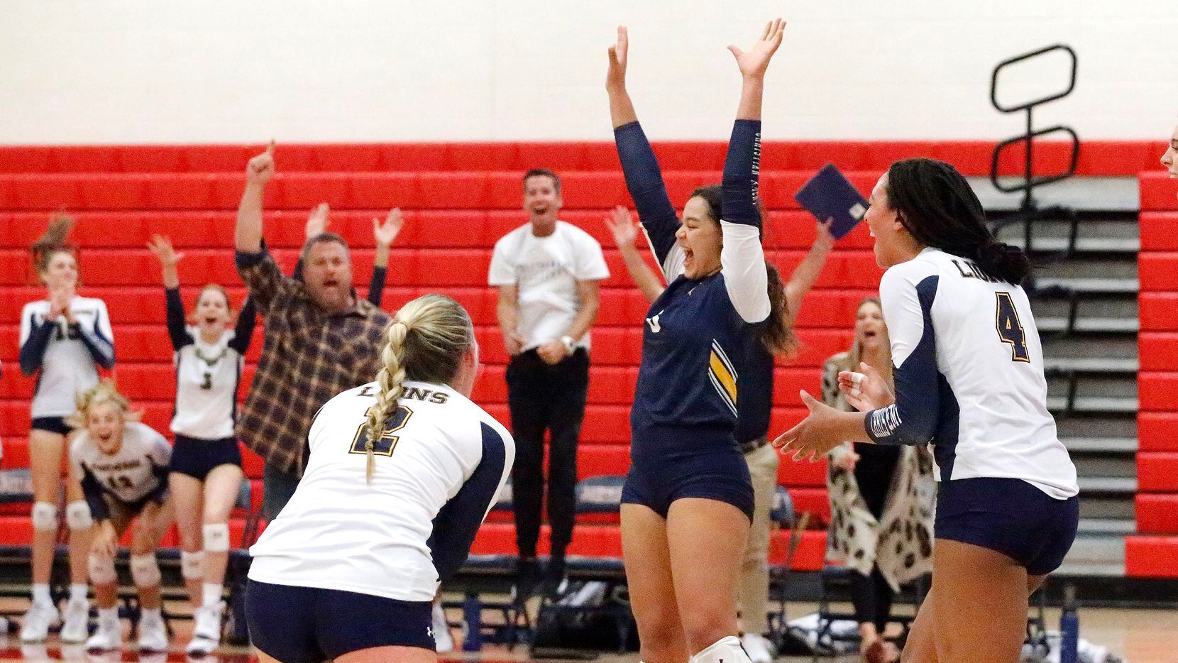 Plano Prestonwood Christian libero Gillian Pitts (8) reacts to winning the first set during Tuesday's three-set sweep of Plano John Paul II. It was the 13th consecutive win for Prestonwood. (Stewart F. House/Special Contributor)