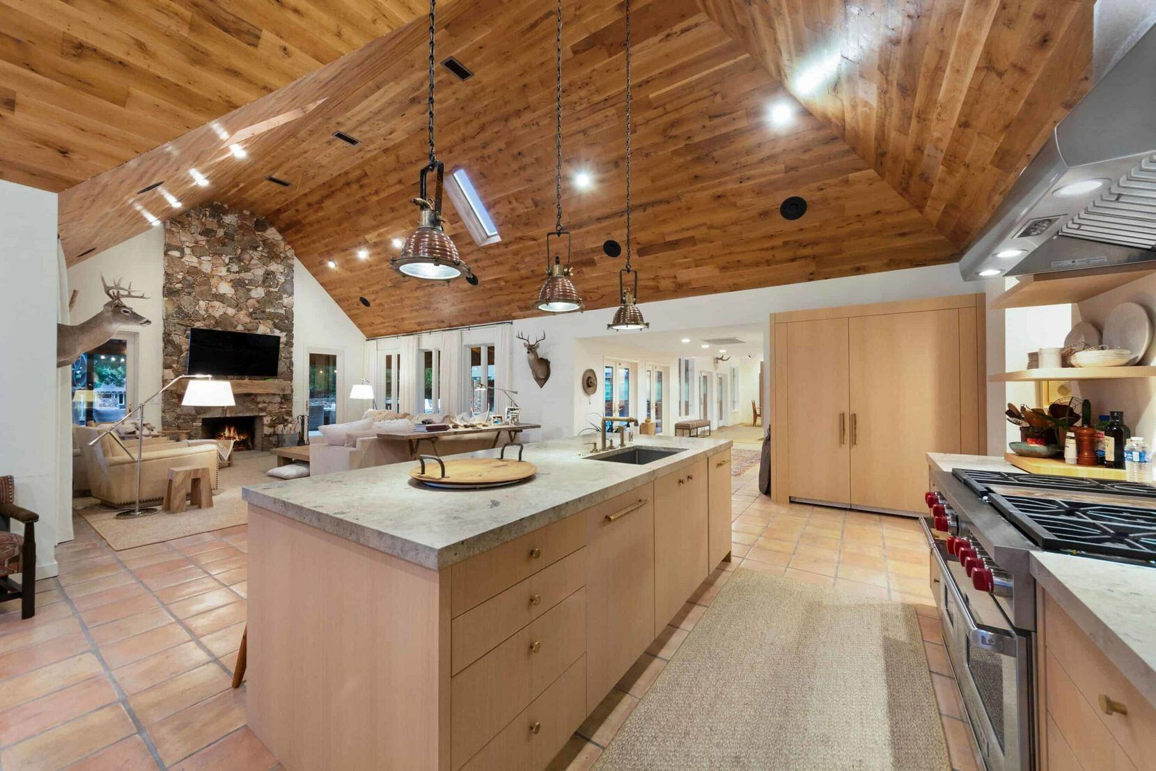 The home on site features vaulted wooden ceilings.