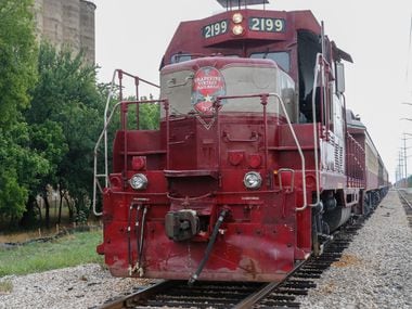 The 1953 diesel locomotive, "Vinny,"  of the Grapevine Vintage Railroad prepares to depart downtown Grapevine in this file photo. (Ron Baselice/The Dallas Morning News)