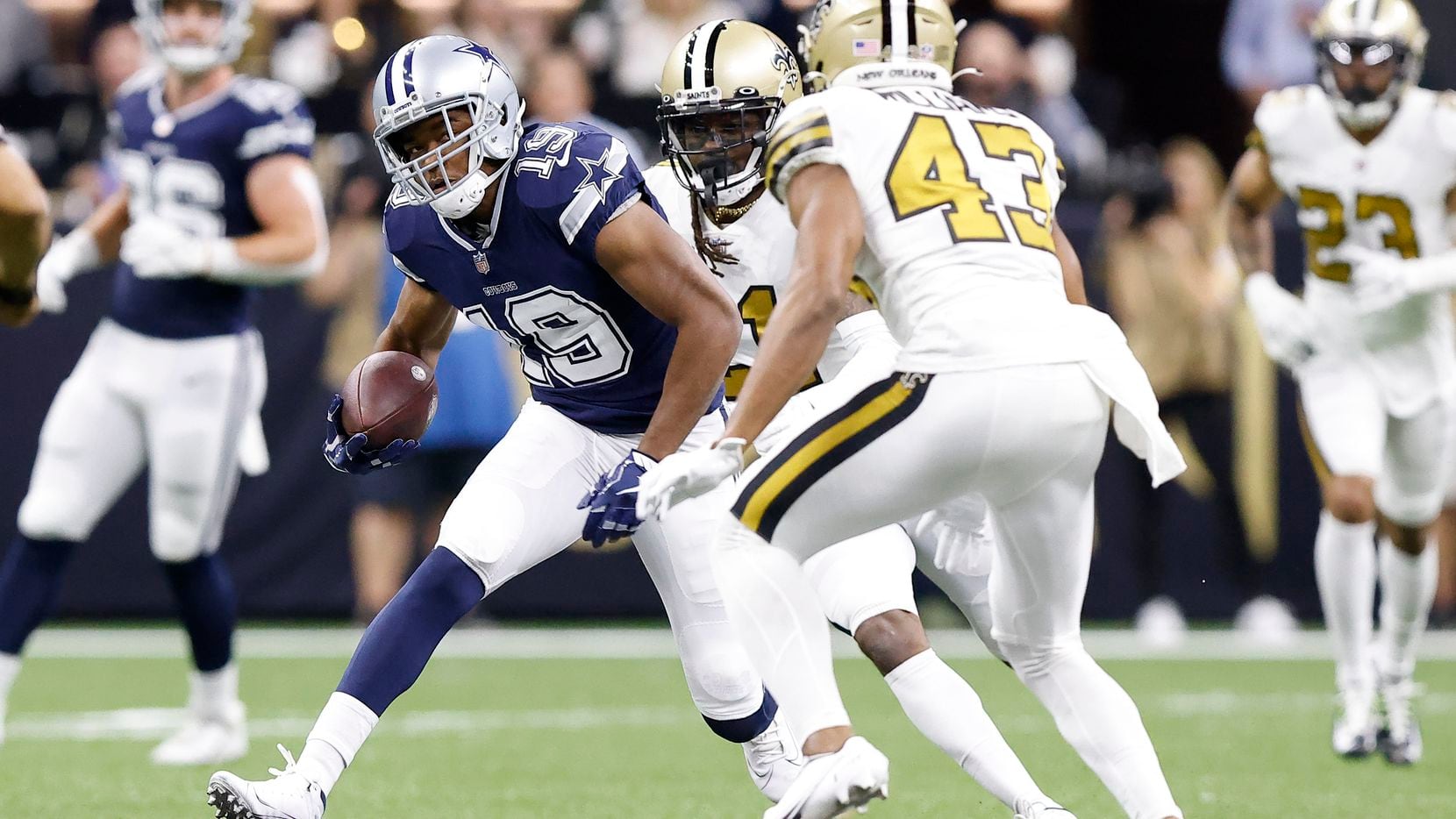 Dallas Cowboys wide receiver Amari Cooper (19) makes a move on New Orleans Saints free safety Marcus Williams (43) after a big first-quarter completion at the Caesars Superdome in New Orleans, Louisiana December 2, 2021.