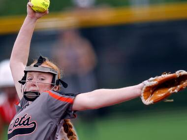 Rockwall pitcher Ainsley Pemberton (9) delivers a pitch to a Converse Judson batter during...