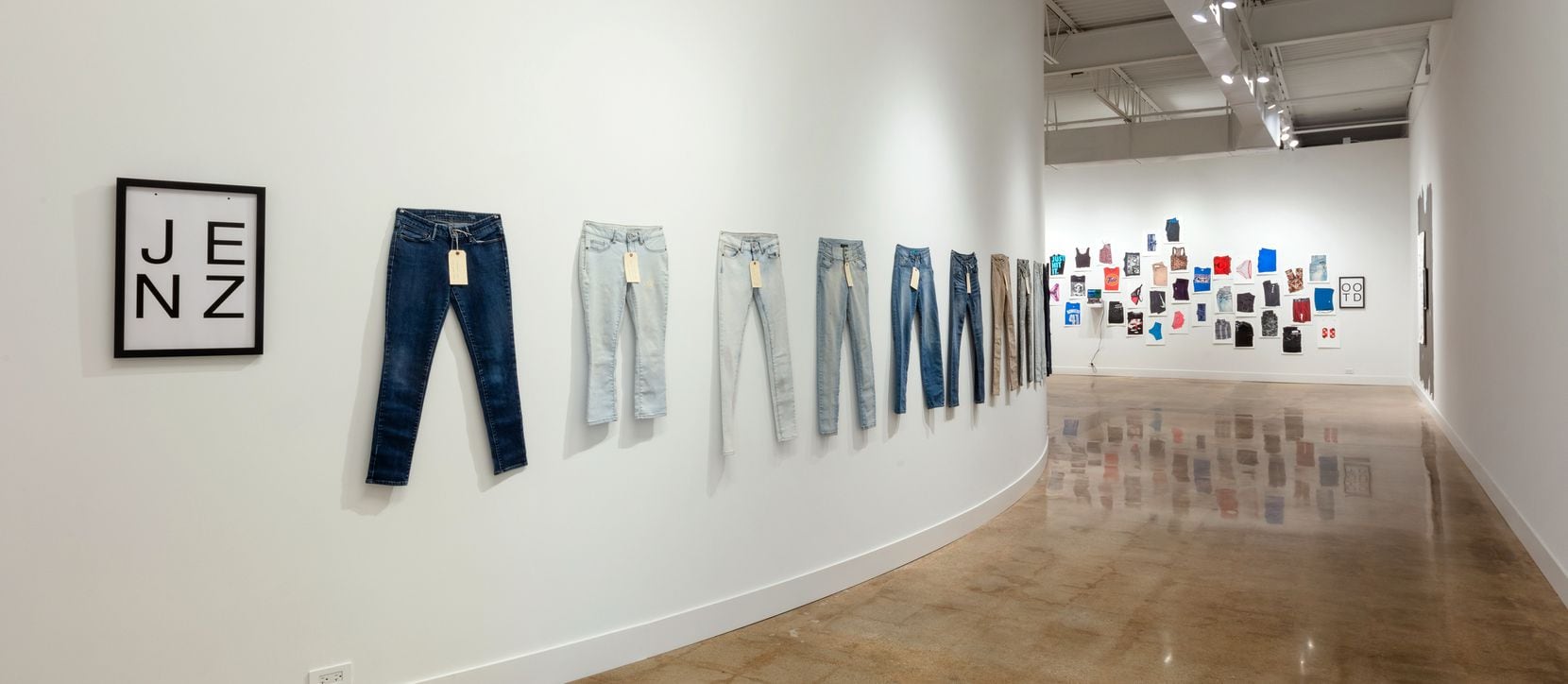 In Kathy Lovas' exhibition, the gallery’s walls are lined with hyper-realistic imagery, installation, paint and pieces of clothing, including prom dresses, blue jeans and women’s underwear.