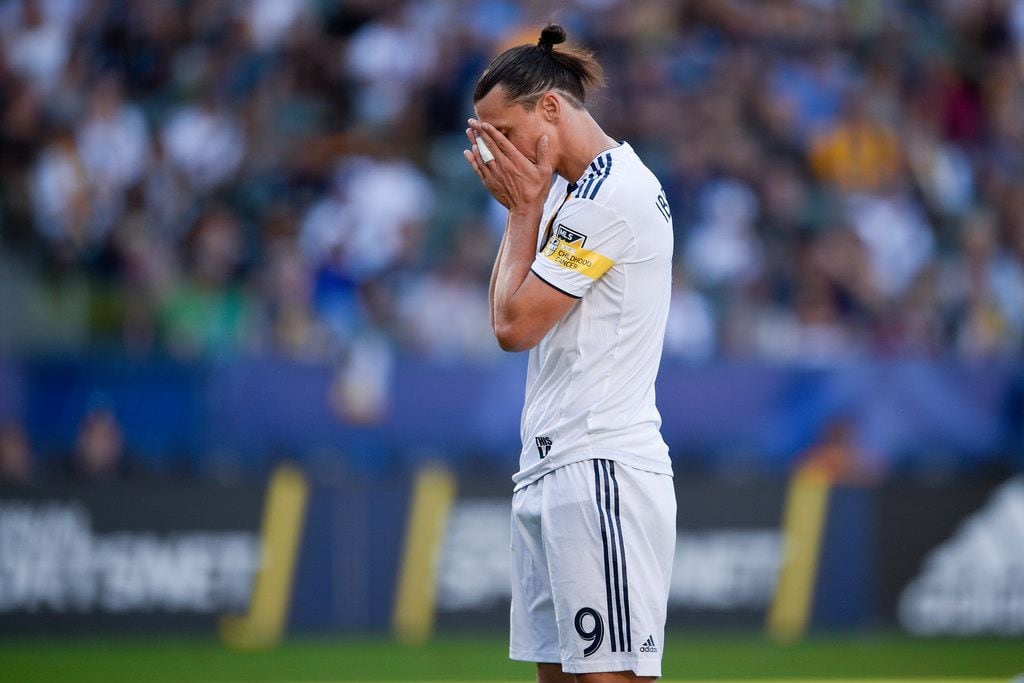 LA Galaxy forward Zlatan Ibrahimovic reacts after missing a pass during the first half of an...