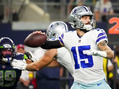 Dallas Cowboys quarterback Will Grier (15) throws a pass during the first quarter of an NFL...