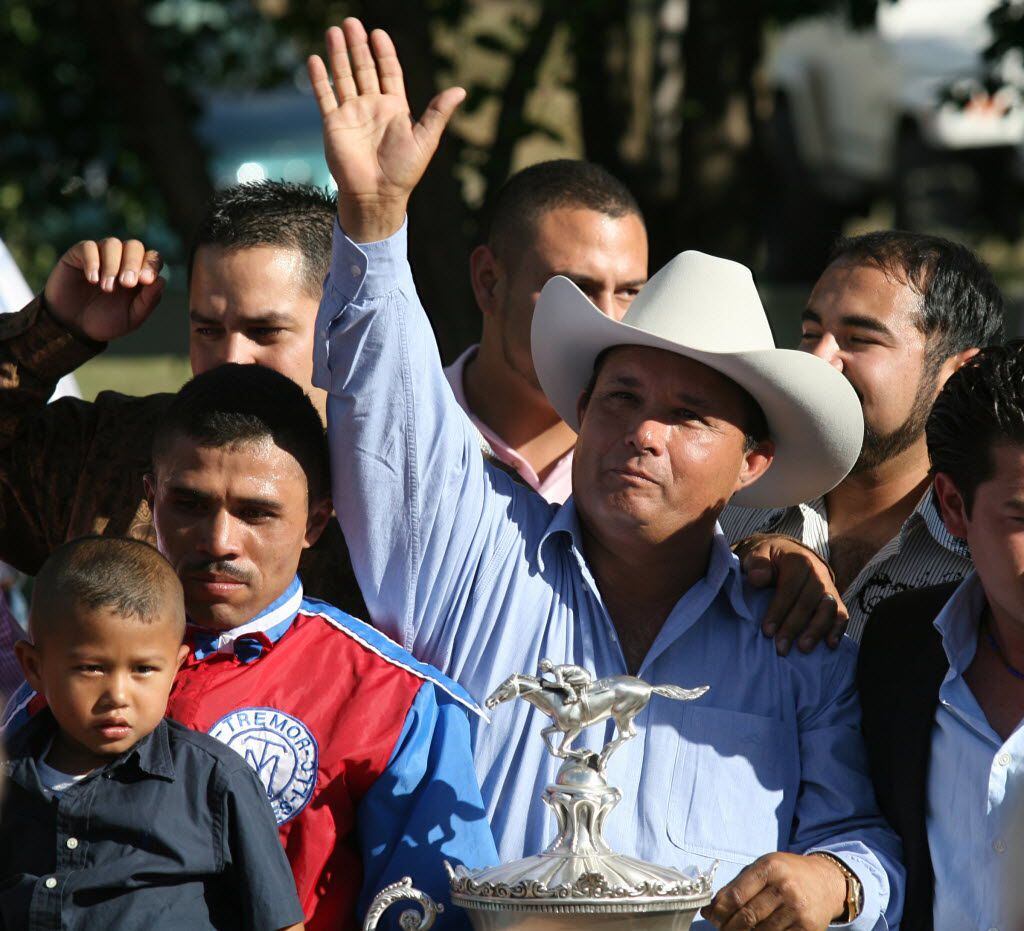 Jose Trevino stood in the winner's circle at Ruidoso Downs, N.M., after his horse Mr. Piloto...