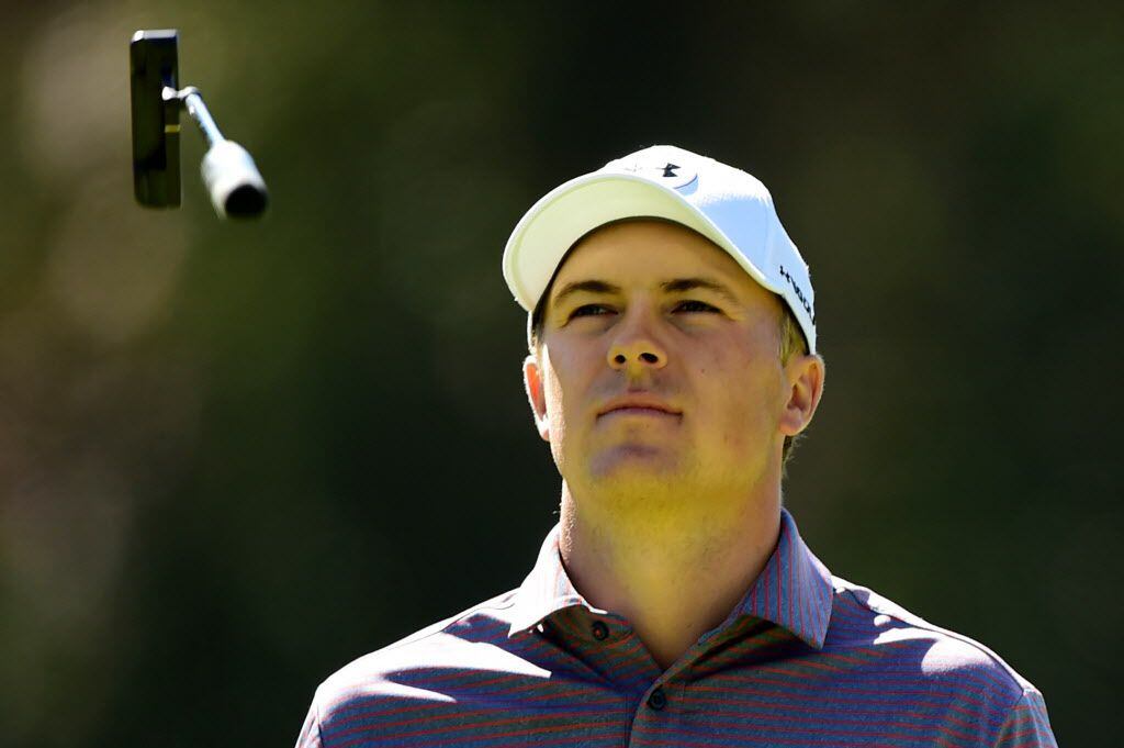 PACIFIC PALISADES, CA - FEBRUARY 19: Jordan Spieth reacts to making a par putt on the eighth...