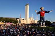 Crowds fill Big Tex Circle to see the larger-than-life cowboy and the Tower Building during...