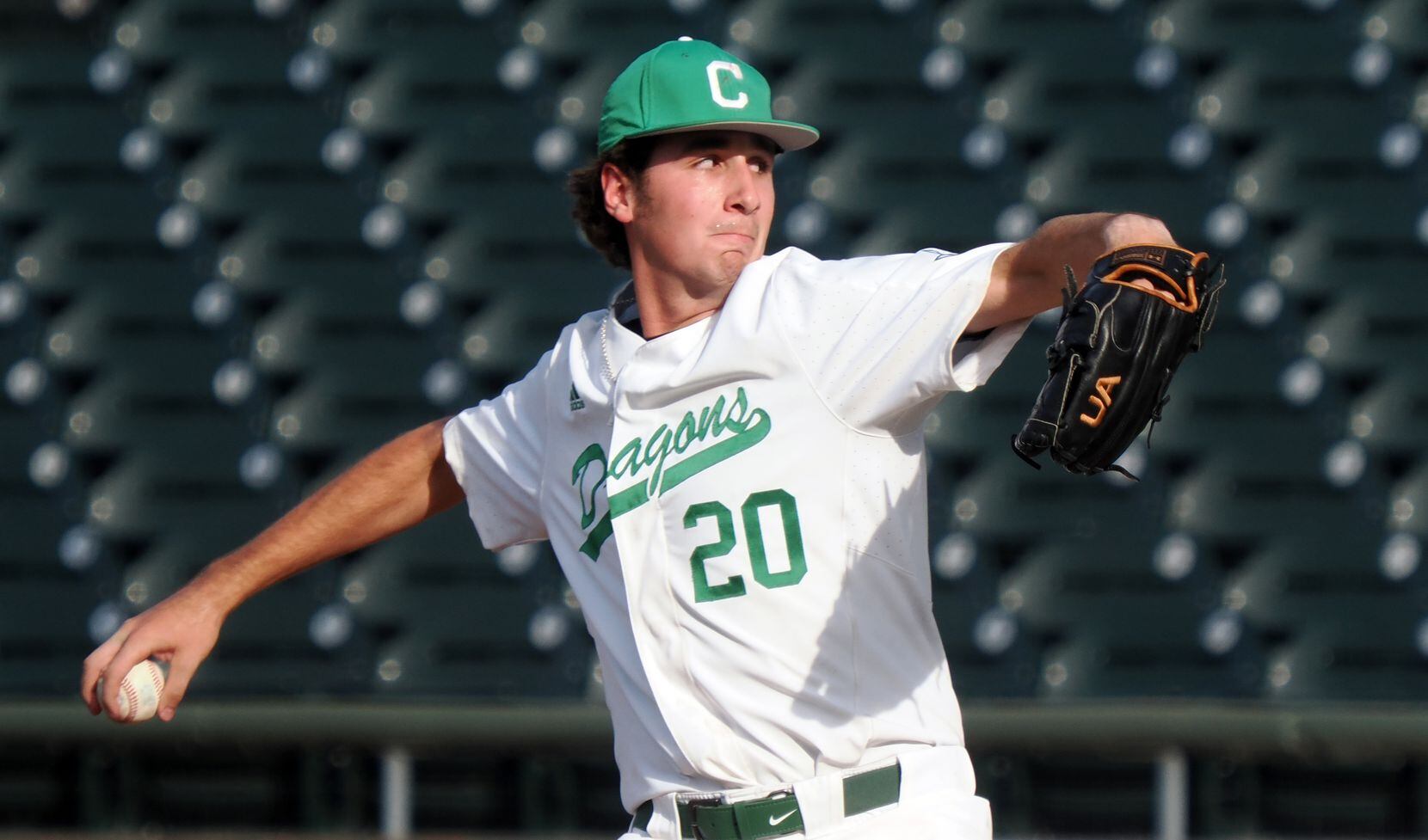 Southlake Carroll relief pitcher Tyler White (20) pitches against San Antonio Reagan in the...