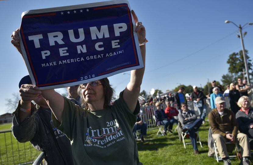 A Donald Trump supporter makes her point during the 1st Congressional District Republican...