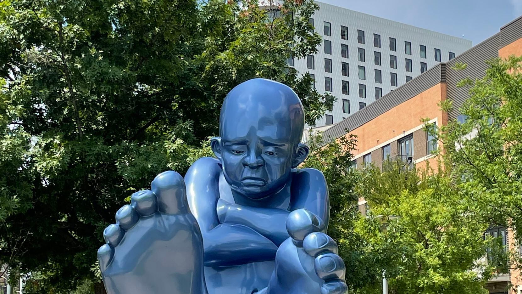 Babyfoot is a 13-foot-long and 8-foot-tall baby blue sculpture by Idan Zareski located in...