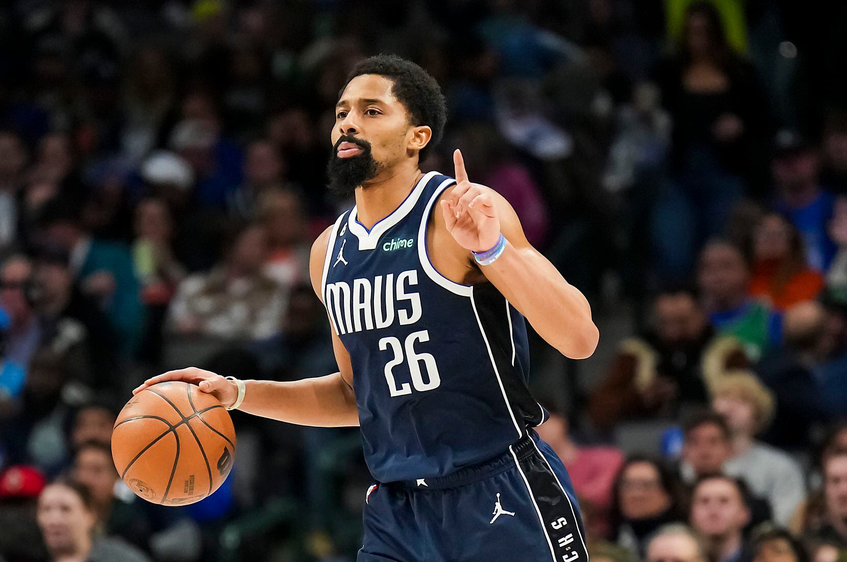 Dallas Mavericks guard Spencer Dinwiddie (26) brings the ball up the court during the second...