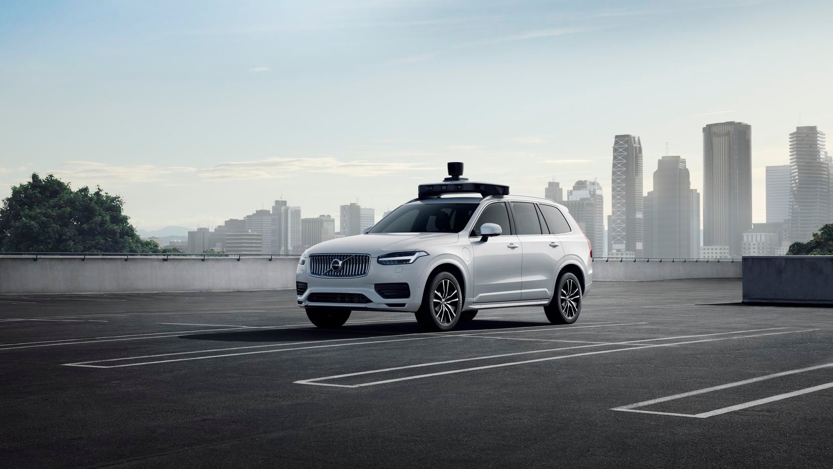 Uber's white Volvo SUVs will start mapping downtown Dallas streets this fall to understand...