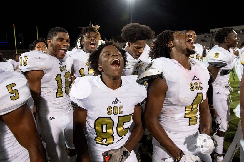 South Oak Cliff senior wide receivers OJ Spencer (85) and DeMarco Moon (4) celebrate with...