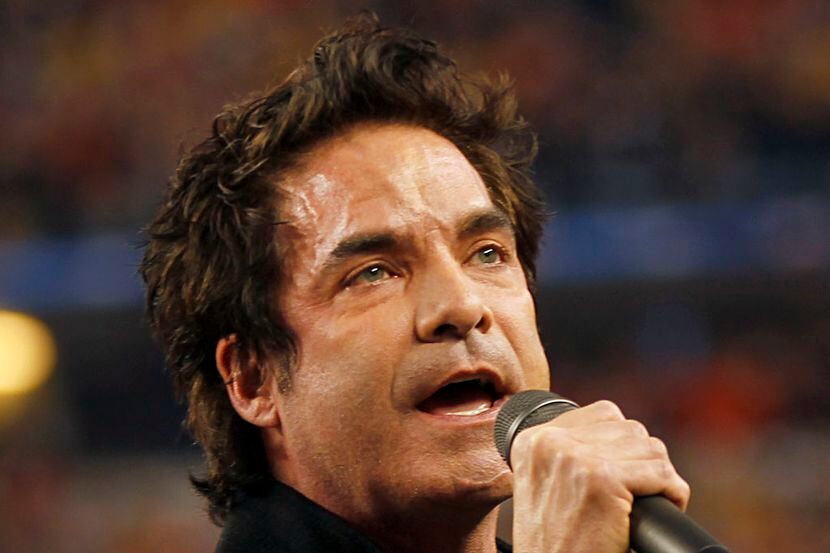 Patrick Monahan of Train sings the National Anthem before the Cotton Bowl game.