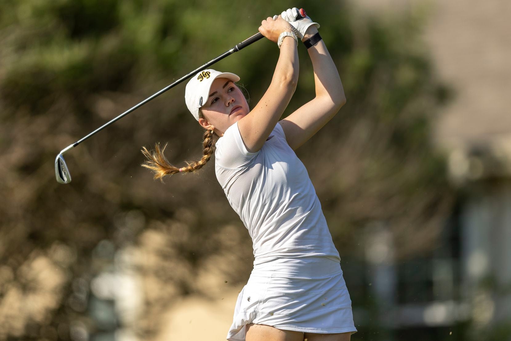 Highland Park’s Sophie Biediger hits from the 2nd tee box during the 5A girls state golf...