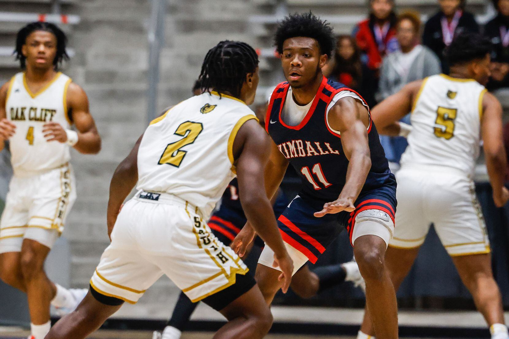 Justin Kimball's Barack Holland (11) guards South Oak Cliff's Jayden Miller (2) during the...