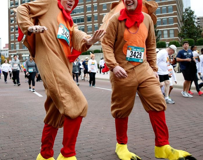 Costumed participants have fun at a Turkey Trot event.