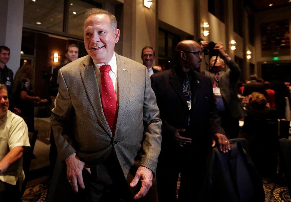 Roy Moore greeted supporters before his Senate election party in Montgomery, Ala. President...