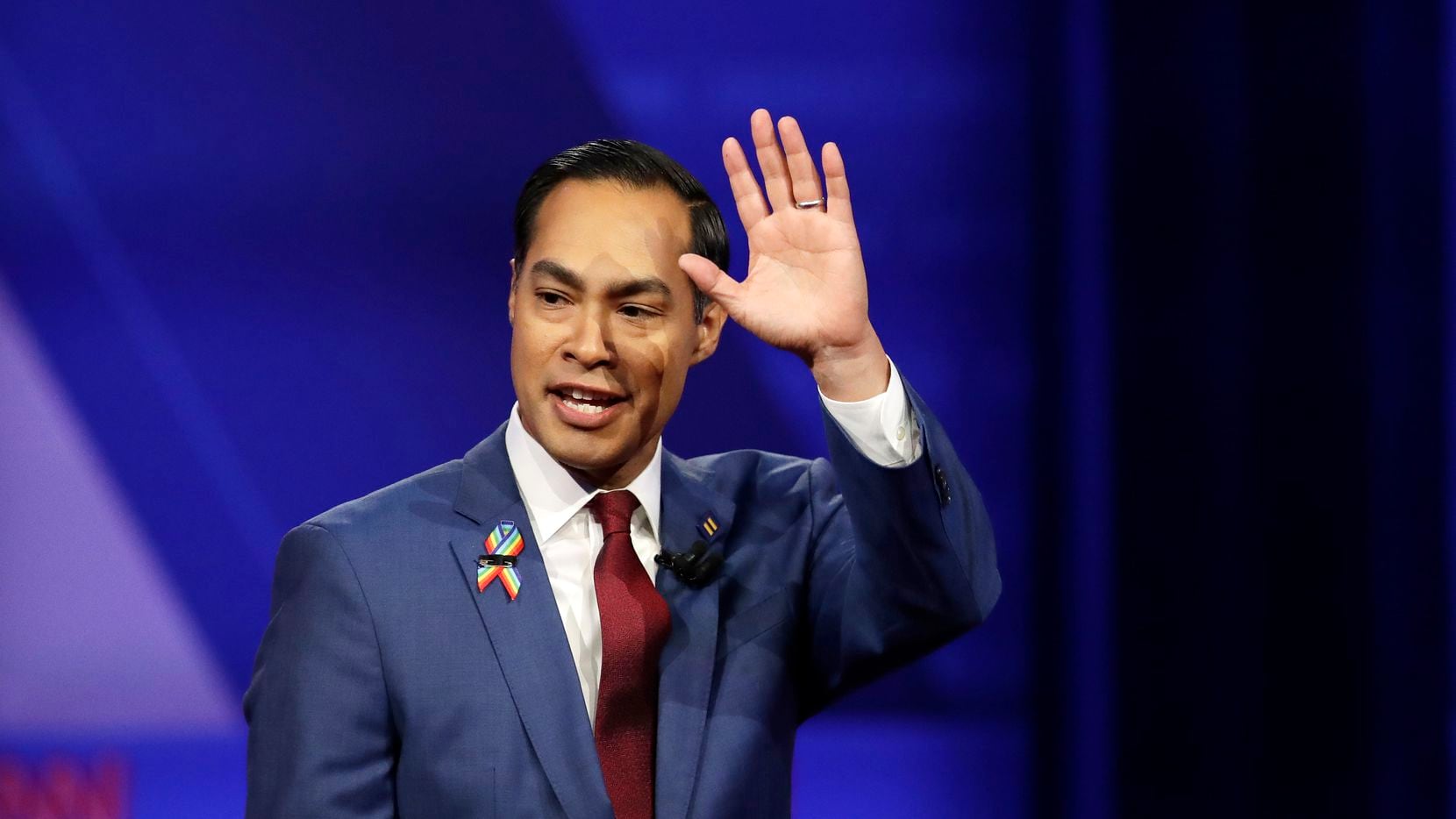 Former Housing and Urban Development Secretary and Democratic presidential candidate Julian Castro waves as he takes the stage during the Power of our Pride Town Hall Thursday, Oct. 10, 2019, in Los Angeles. The LGBTQ-focused town hall featured nine 2020 Democratic presidential candidates. (AP Photo/Marcio Jose Sanchez)