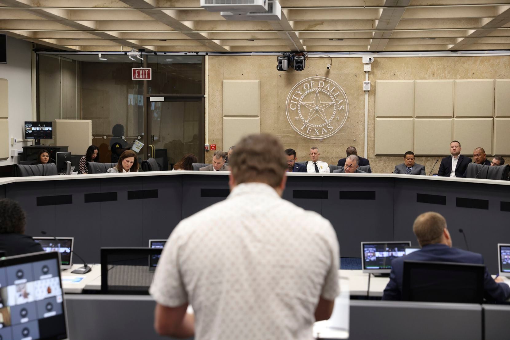 Harley Barnes from Lively Local Markets speaks at a Dallas police and City Council meeting...