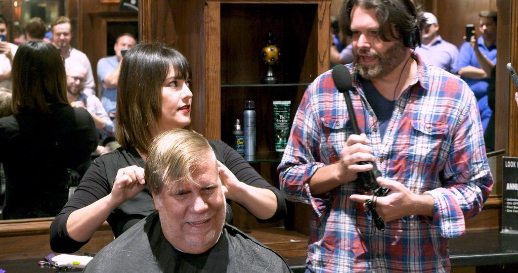 Stylist Vicky Peña begins cutting The Ticket's George Dunham's hair at Boardroom Salon for...
