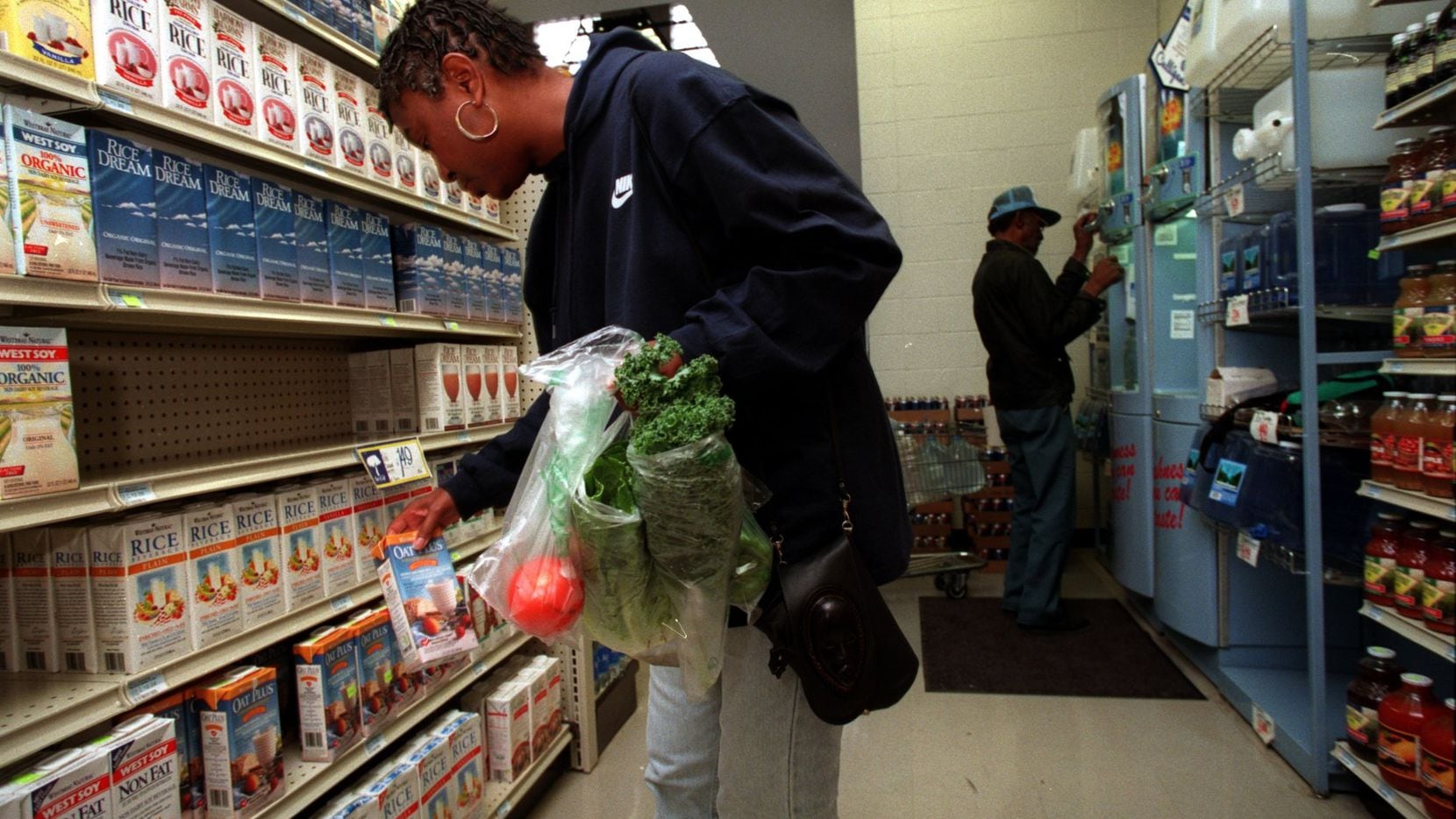 In this file photo, Peggy Jones shops for soy milk at Ann's Health Food Center and Market in...