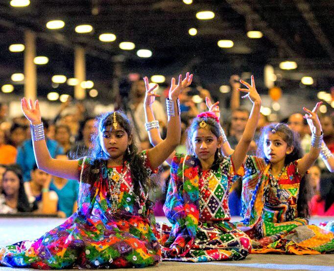 Children perform on stage during Diwali Mela at Fair Park. 