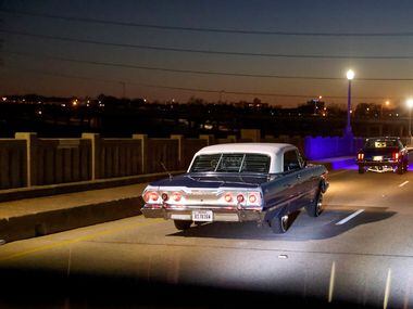 Dallas Lowriders cruise back to Jefferson Boulevard after looping through downtown Dallas on...