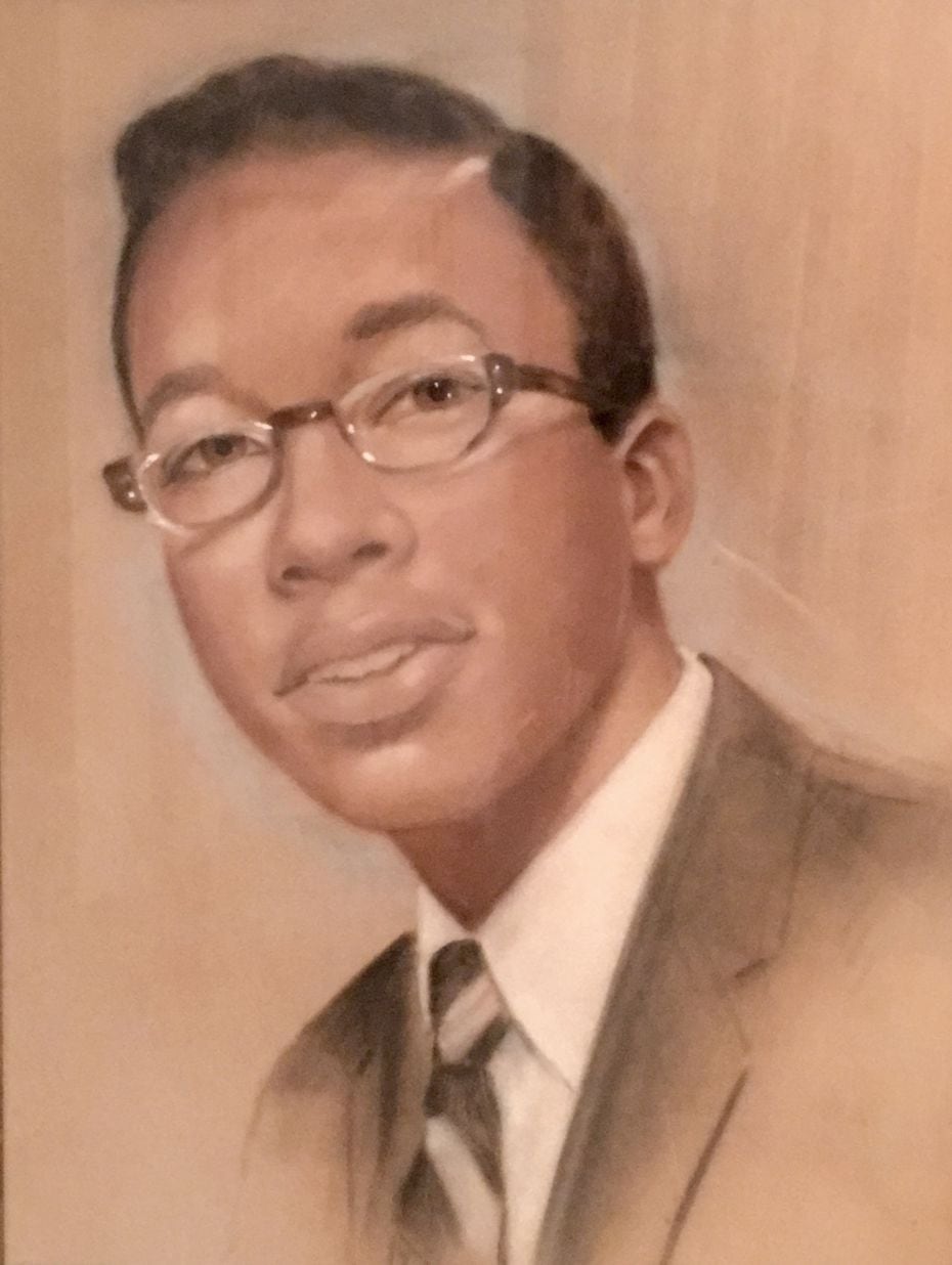 An image of John Wiley Price as a young man, one of many in a sibling's collection of family...