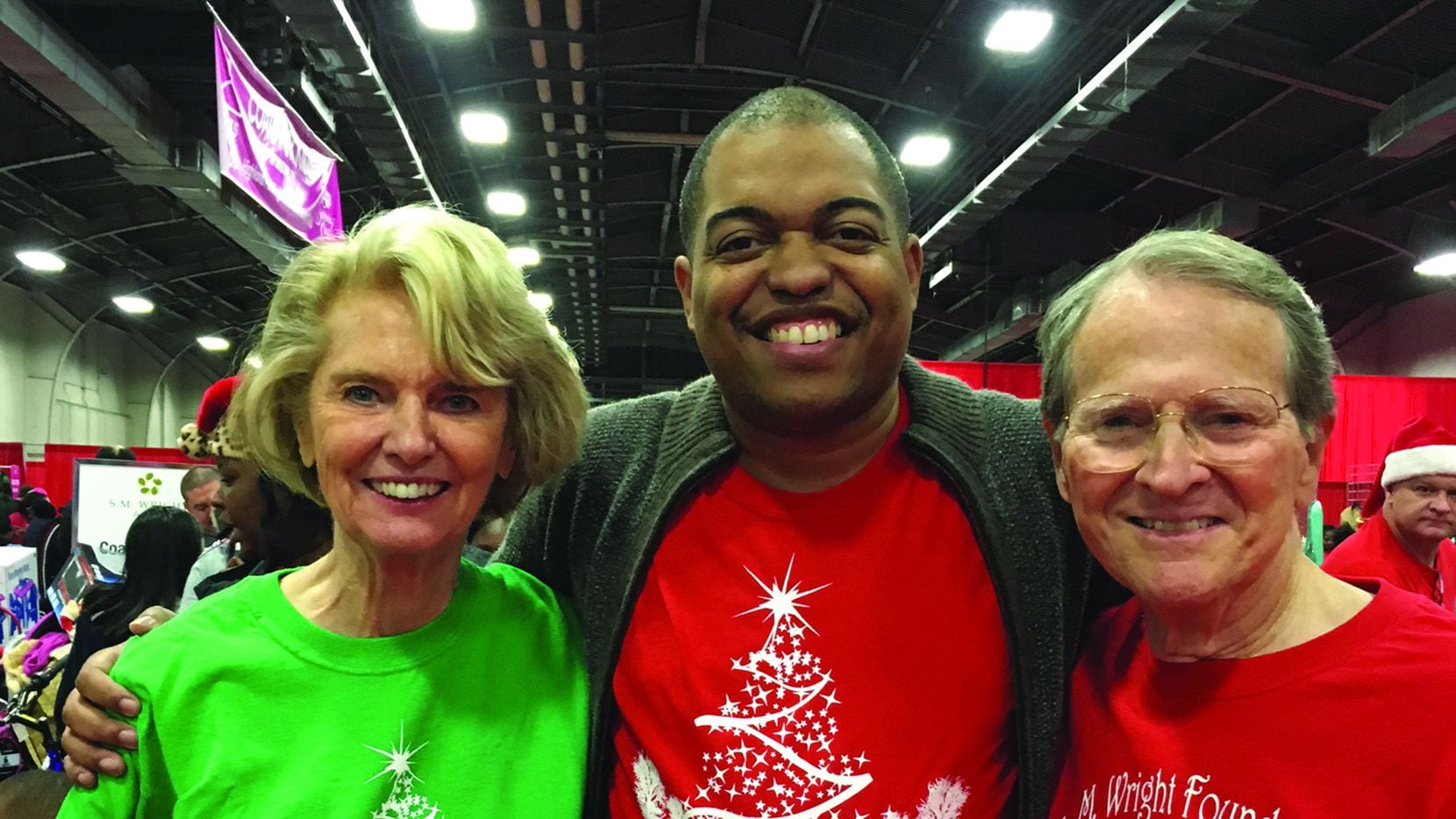 Allie Beth and Pierce Allman are pictured with S.M. Wright III at a Christmas in the Park...