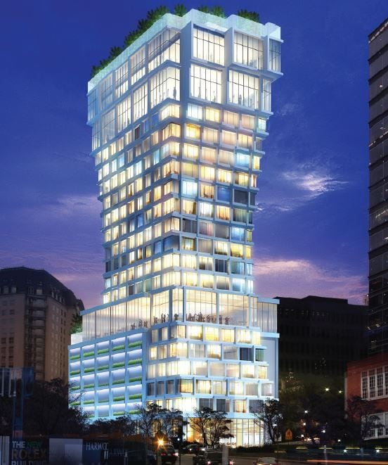The 20-story hotel tower is under construction at Pearl and Olive streets in Dallas' Uptown...