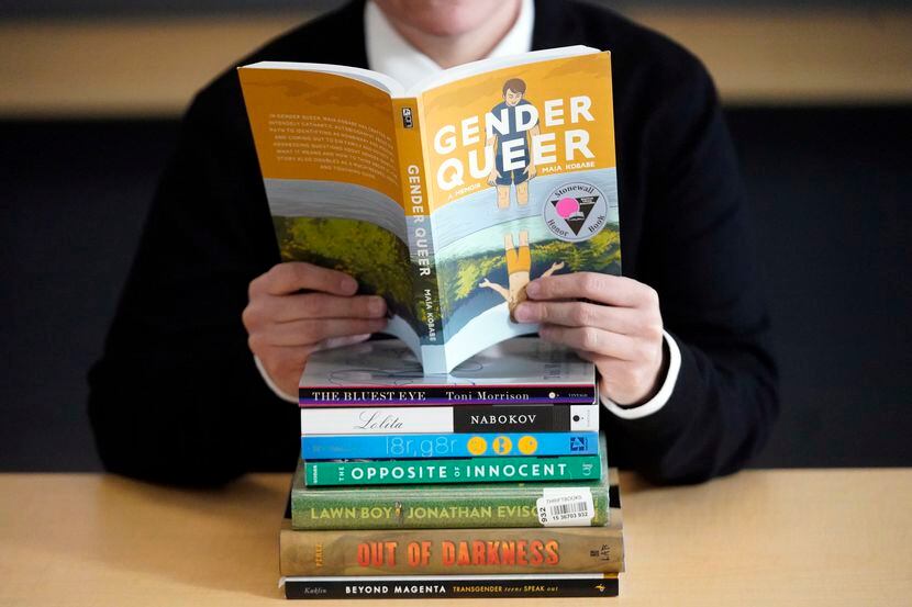 FILE - A pile of challenged books appear at the Utah Pride Center in Salt Lake City on Dec....