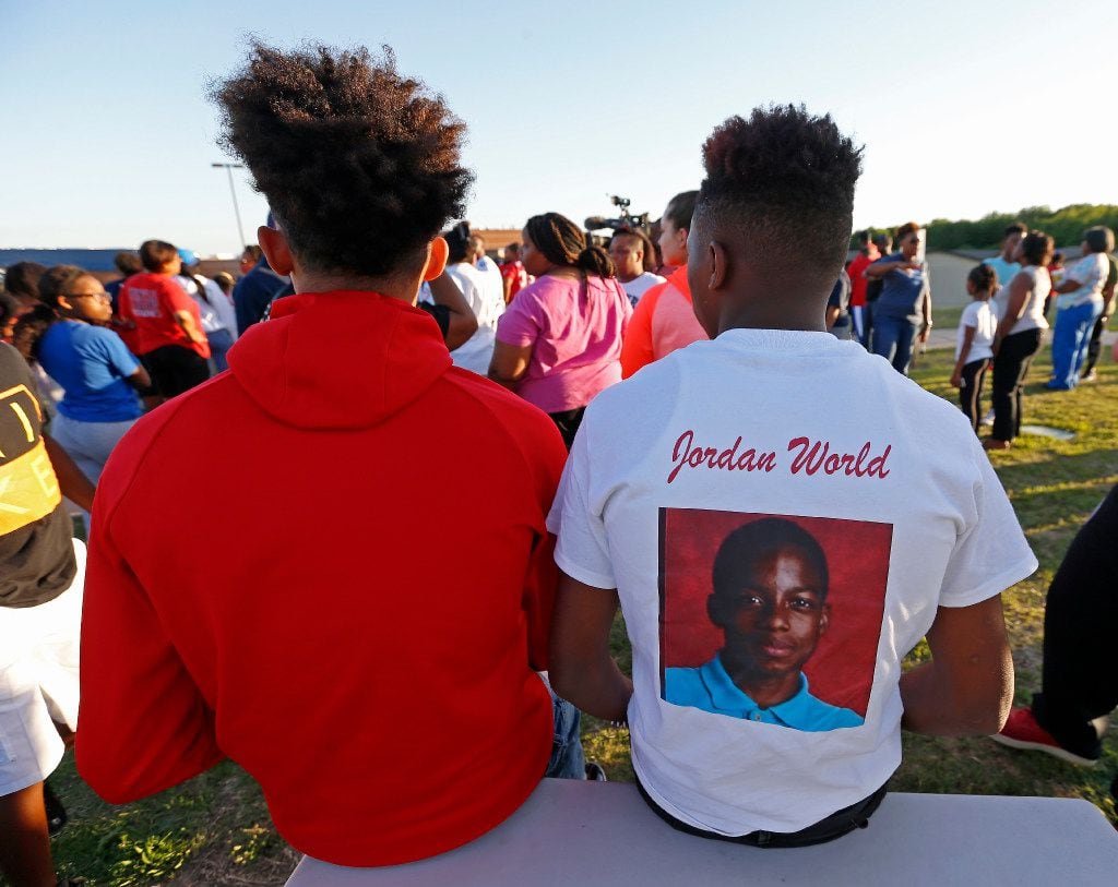 Alandre Henderson (right) wears a shirt in memory of Jordan Edwards during a vigil at Gentry Elementary School in Mesquite, Texas, Monday, May 1, 2017. Henderson said he and Jordan have been friends since they were 6 years old. Edwards was shot and killed by a Balch Springs police officer Saturday night. (Jae S. Lee/The Dallas Morning News)