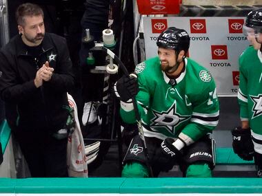 Dallas Stars left wing Jamie Benn (14) is recognized for his 1,000th game played during a...