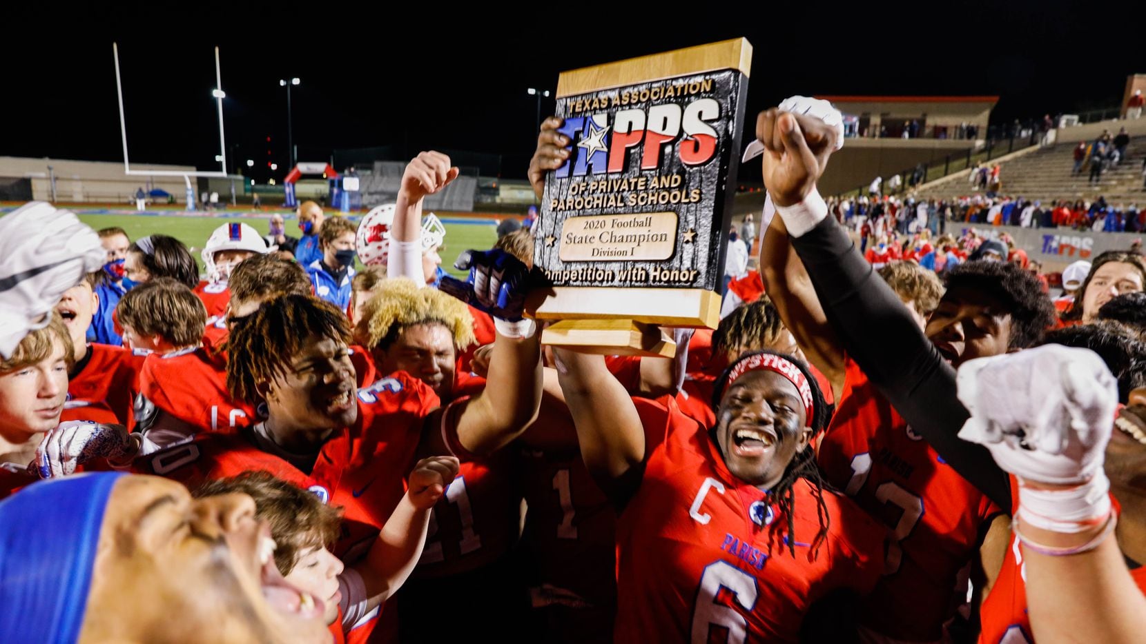 Parish Episcopal's players celebrate their win after winning the TAPPS Division I state...